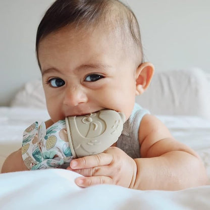 Itzy Ritzy Silicone Teething Mitt - Soothing Infant Teething Mitten with Adjustable Strap, Crinkle Sound & Textured Silicone to Soothe Sore & Swollen Gums 3 Months