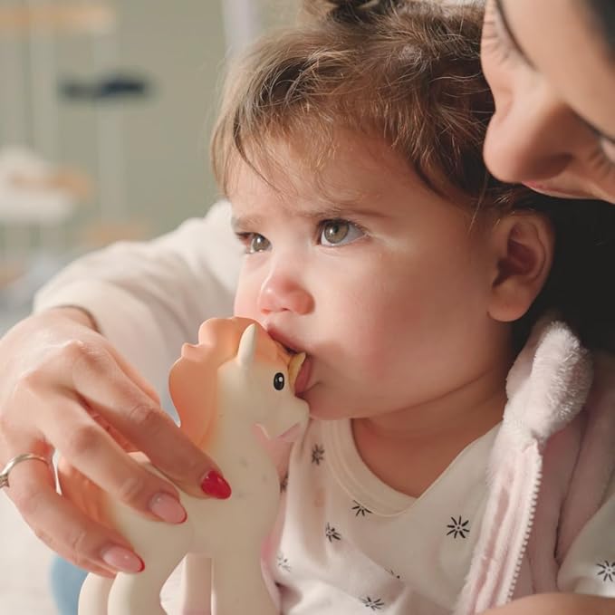 Nuby Penny The Unicorn Super Soft Teether Toy with Squeaker, 100% Natural