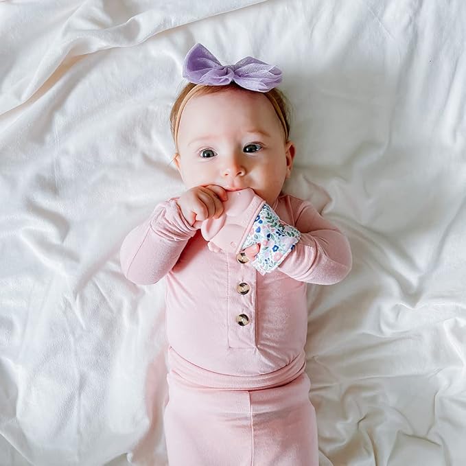 Itzy Ritzy Silicone Teething Mitt - Soothing Infant Teething Mitten with Adjustable Strap, Crinkle Sound & Textured Silicone to Soothe Sore & Swollen Gums 3 Mos