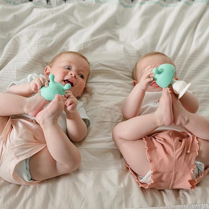 Nuby Super Soft Silicone Teether with Suction Base - Visually Stimulating and Easy to Grasp Toy for Baby Teething Relief 3+ Months